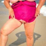 This day was a beach day.  She wanted to go bottomless.  Do you like being nude at that beach?