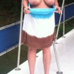 Flashing her tits while out on the lake