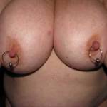 Nipples pinched with rings