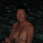 Wife in pool waiting for me to cum on nipples and suck them clean.