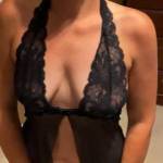 Betty trying on a new black outfit