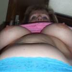 Mrs Seeker shot from below peaks over her big titties!