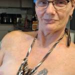 Lovely boobs out in the kitchen