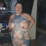 KT posing in lingerie.
