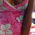 Showing me her big tits.