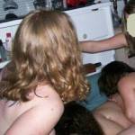 My husband is taking the pictures while us girls have some fun at a house party we had with 4 other women.