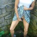 fucking her pussy with small dildo in a park