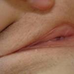 a very close up shot of my girls very tight pussy