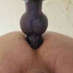 Underneath view as I stuff my ass with my knotted dildo