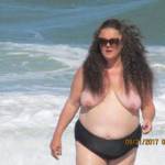 Look at this sexy sea goddess at the topless beach