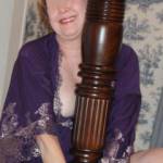 What is she doing to that bedpost?  Bad Girl!