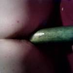 Stretching my pussy on a fat cucumber