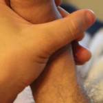 Holding my hard uncut penis.