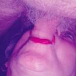 She got red lipstick all over his dick.