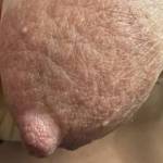 I pose for your pleasure hope you enjoy this pic of my oddly shaped nipple and Areola.