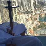 Chilling on the balcony of the Cosmopolitan. Would you come sit on it and give the people below a show?