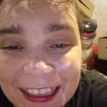 Just a happy girl with a face covered in cum