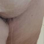 Water dripping off her bush