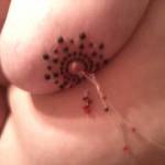 Wearing tittie jewels and nipple chains