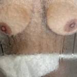 I love when she presses those big naturals against the shower door.  Her nipples and areolas look especially sexy here!!