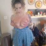 Remy looking so sexy holding her titties