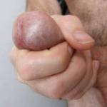 Many of you commented on my cock head, here it is in a nice squeeze, all swollen .....