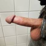 Horny at work in the bathroom.