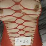 The Mrs. trying on some new lingerie. How do you all feel about the red outfit?