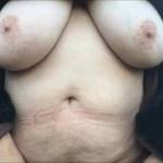 The first outdoor video of the year. Under a tree in the woodland on the slope, her big tits are out, and her trousers have the zipper open ready - so she gives a lovely glimpse of the hairiness ...