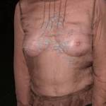 Bev camps down the river with water skiing friends over Christmas. I took a few photos of her to show her how daggy she looked. Trackie dacks on and an old hippy top. Both she and I had no idea what the flash would do to her top lol.