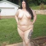 My lovely wife posing nude outdoors for the camera. Too bad the neighbours weren't around - they missed a great show!