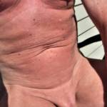 I like to lay out in the sun and tan my all over.