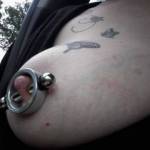 A closer view of Sally wearing  her new nipple clamp in public..