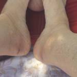 Rubbing my dick with her feet..