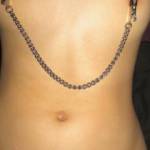 after spanking her heavily, i could tell her pussy was extremely wet. i continued to torture her with the nipple clamps. gently pulling first. pulled harder and she got even wetter. i decided to fuck her ass, fill her with cum and told her to leave.