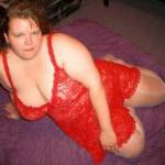 Picture of me slutty wife in some red lingerie.