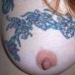 gfs.tattood tit. want to suck on it?