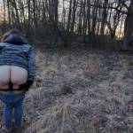 Bending over for a quick picture in the woods