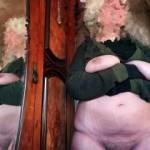 Standing alongside a mirror today