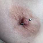 Nice and hard from sucking her pierced nipple….