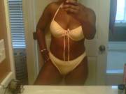 Me posing in front of the mirror. I like how this bathing suit fits me. how about you?