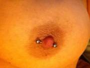 Close up nipple piercing