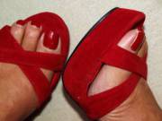 Red heels, red toenails