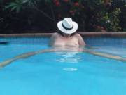 Relaxing in the swimming pool at home.
You can just swim across and stick your big cock inside me now.