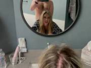 Taking quick break from work to sneak to bathroom for a quick fuck while watching in mirror. Wifey swallows her prize at end.