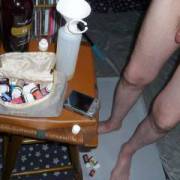 My feet, legs & dick as I stand near a bar stool, where I am mixing the essential oils & massage lotion...September 2023... Camera used, Z50.