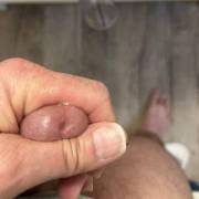 pre cum running down from the tip of my dick onto my finger. dick pump sucked it right out