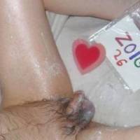 A view from right side of my left leg plus my dick and balls with lube upon  them...A Z50 camera was used.