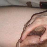 A side view of my thick dick as I am touching it with my finger that has the tong balm- brown stuff.... late April 2025... Z50 camera was used.