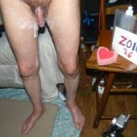 A standing lower body view after my 5TH standing toy play event... my dick and skin are coated in a new white/creamy lube that has flowed down to my knees with a spot on my left foot near my ankle...FZ 150 camera was used.